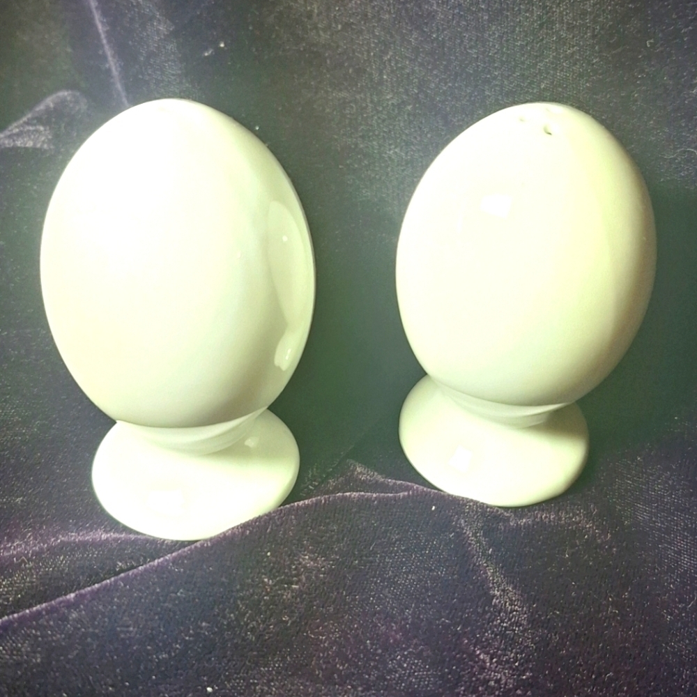 Porcelain white salt and pepper eggs